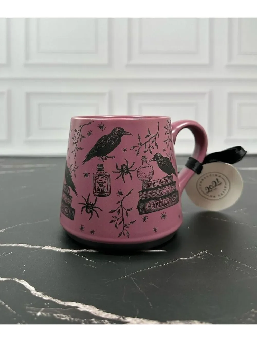 Connecting on Paper 2021 co. Crafted Ceramic Mug with Raven and Spellbook Design